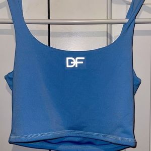 light blue colombian sports top